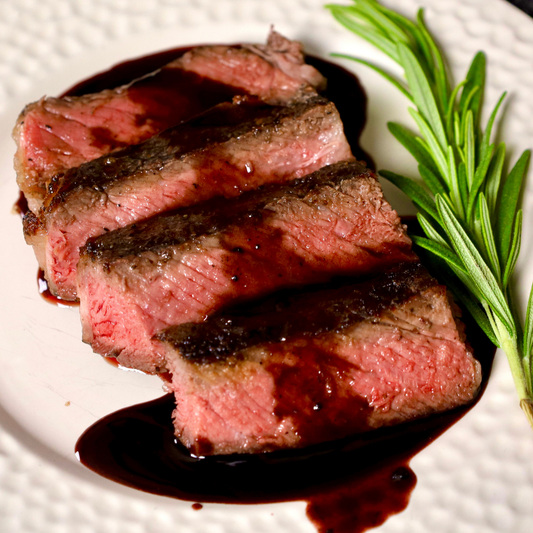 Dusted Ribeye with Red Wine Reduction Sauce